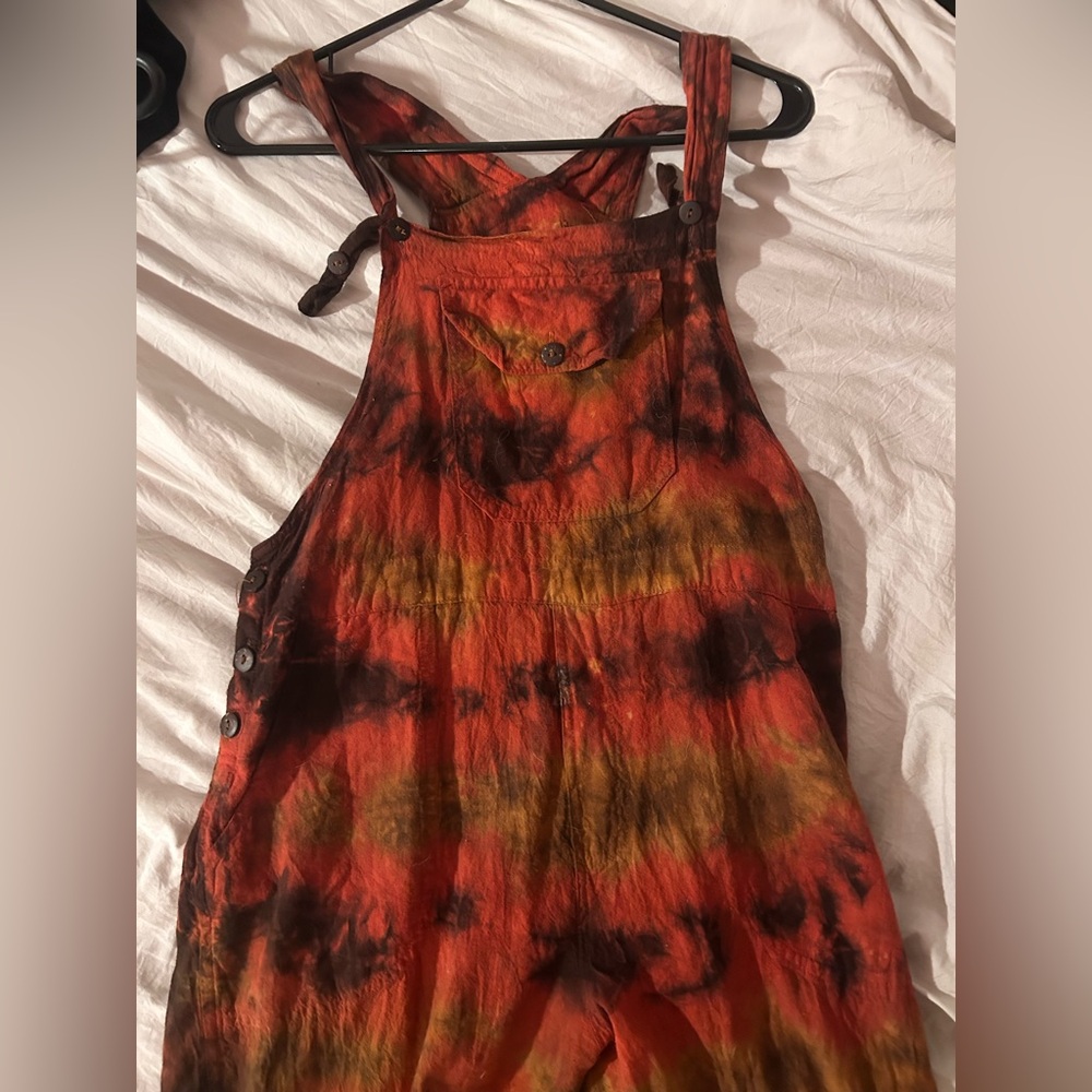 overalls body suit in good condition size L but can fit in any size